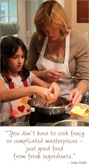 Adult and child baking